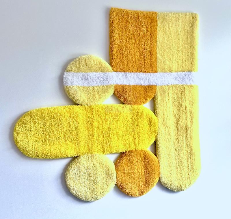 Hand Tufted wall rug made with 100% acrylic yarn and primary backing fabric