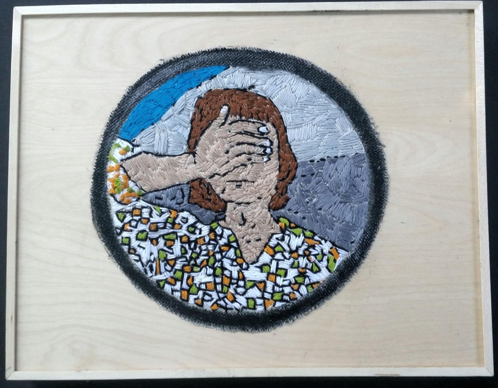 Embroiderd self portrait of selfie. Mounted on wood with graphite