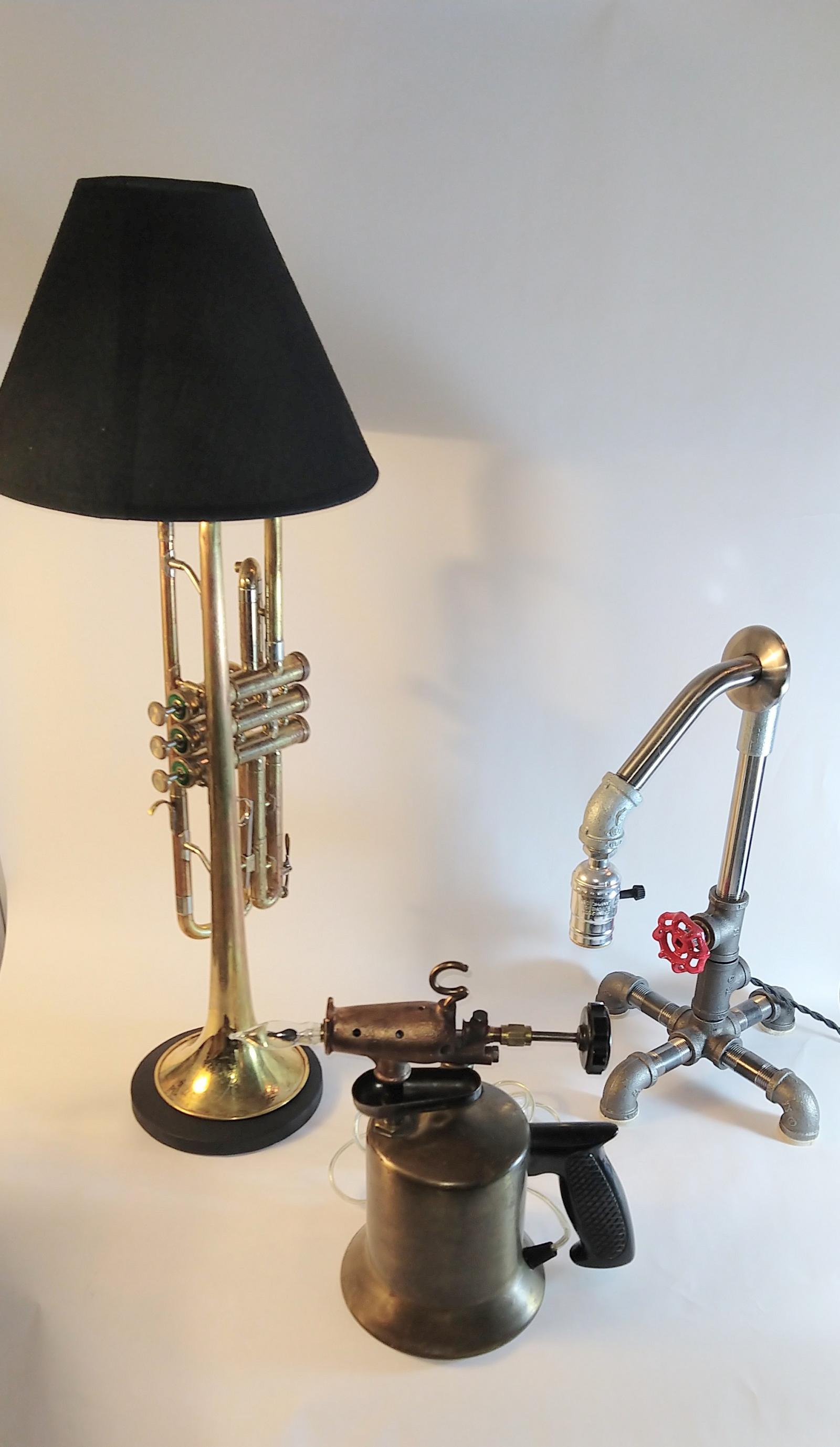 I make a variety of table and pole lamps from recycled and upcycled materials. Contact me for information and pictures of currently available pieces.