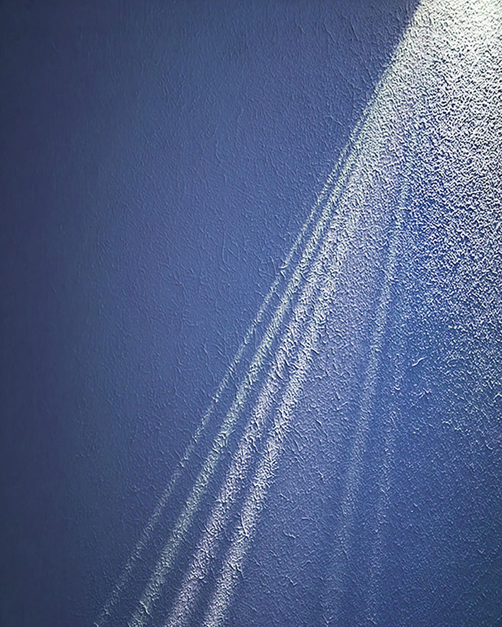 digital photograph of light ray with textured background