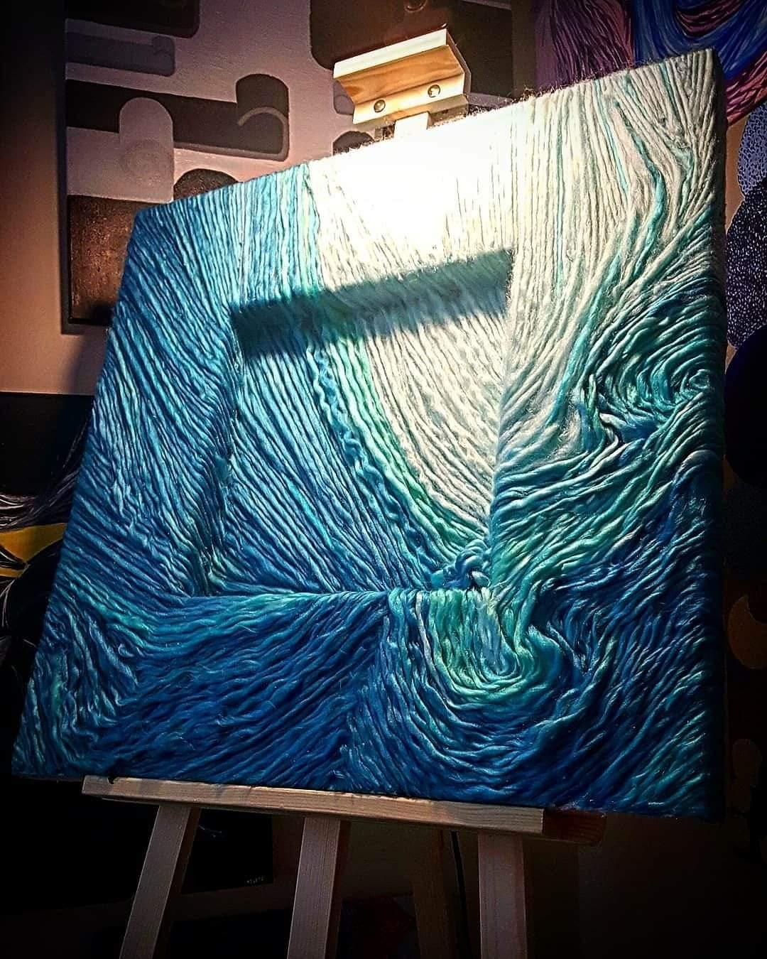 What I like to call yarn manipulation. Individually placed and form to create a soft texture and form.