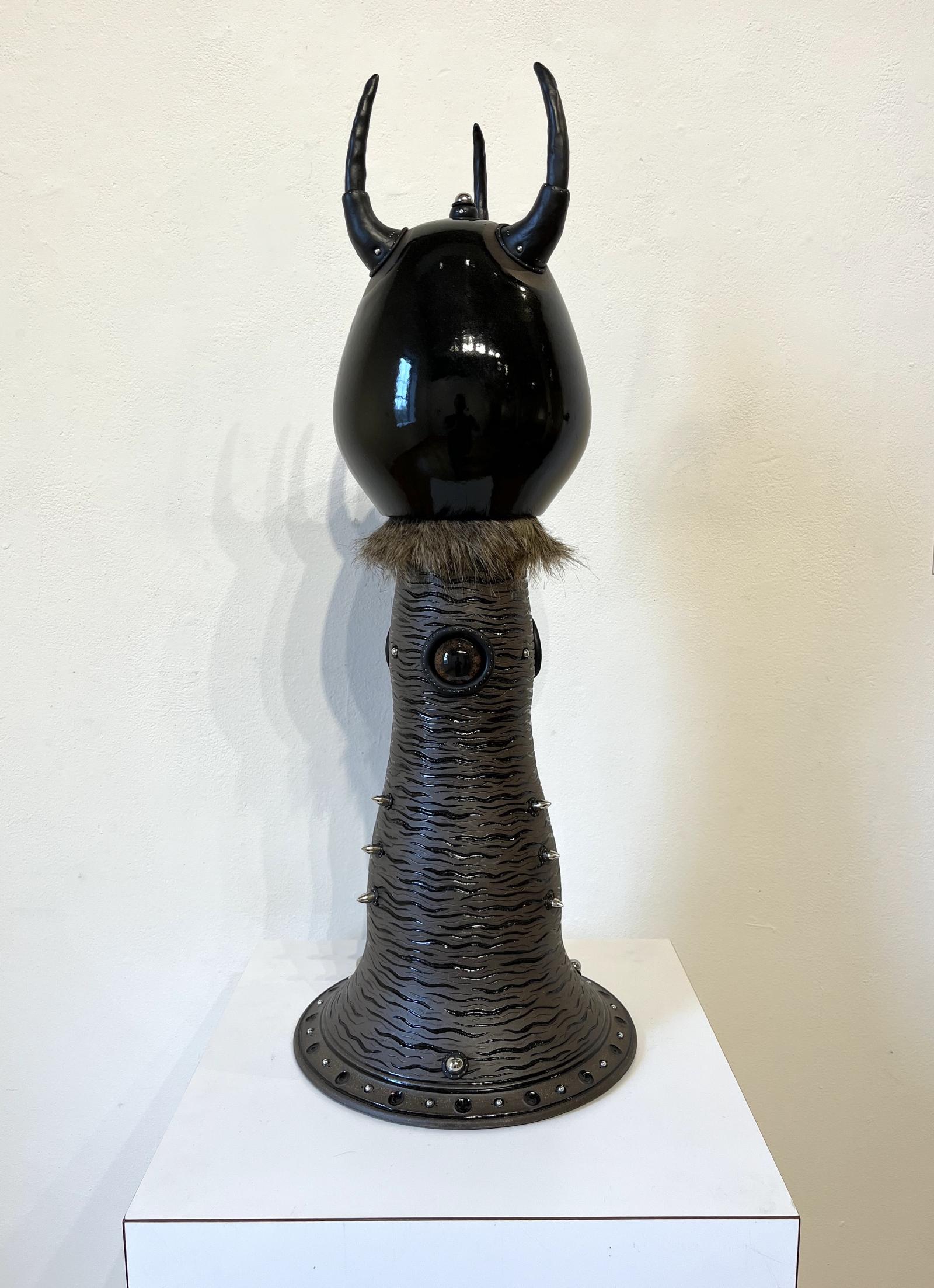 Tall ceramic with mixed media sculpture
