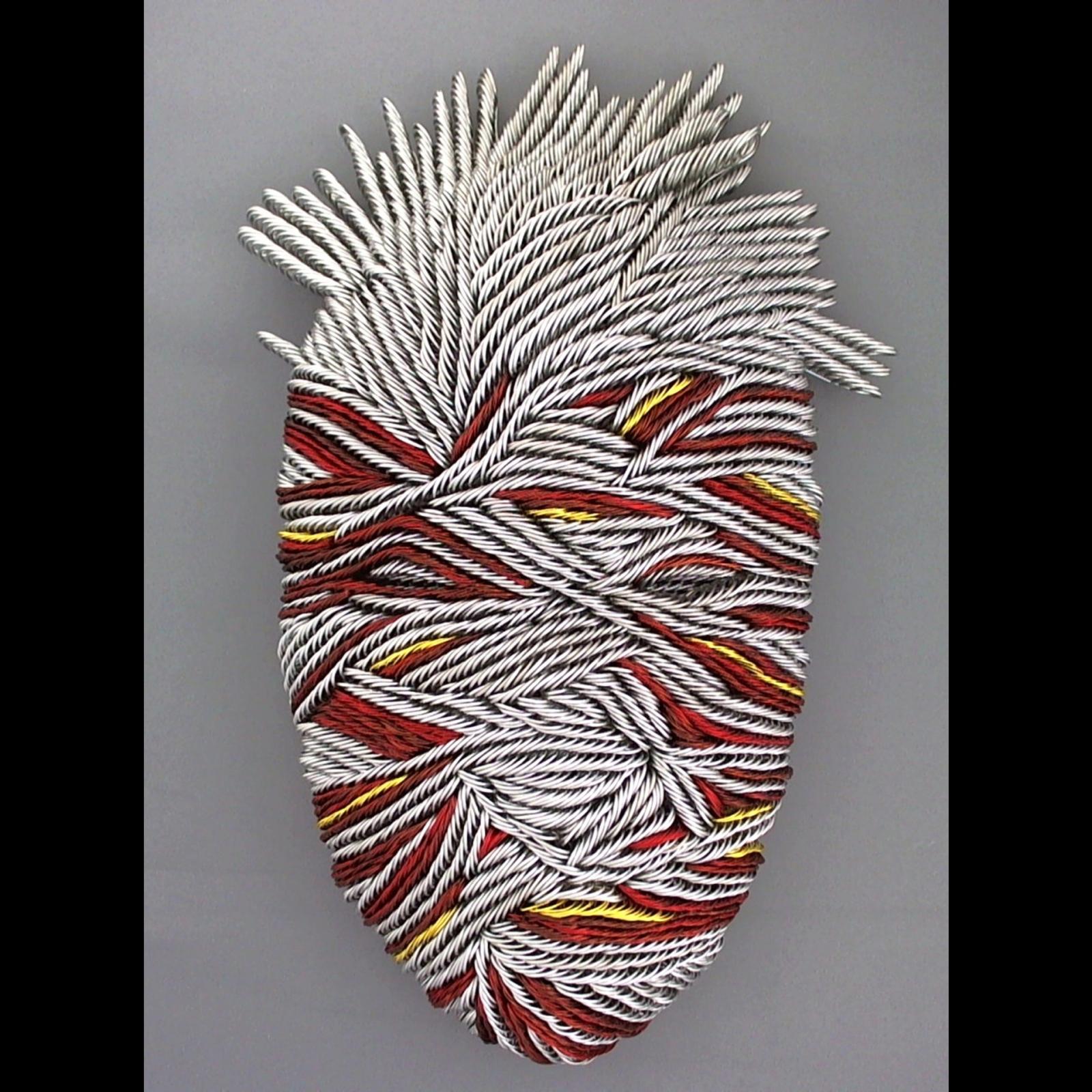 From 500-900 colored wire strands of various lengths and gauges are hand shaped and twisted into mask sculptures.