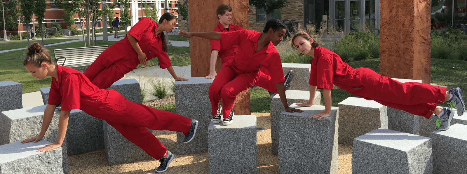People on top of concrete blocks in various poses