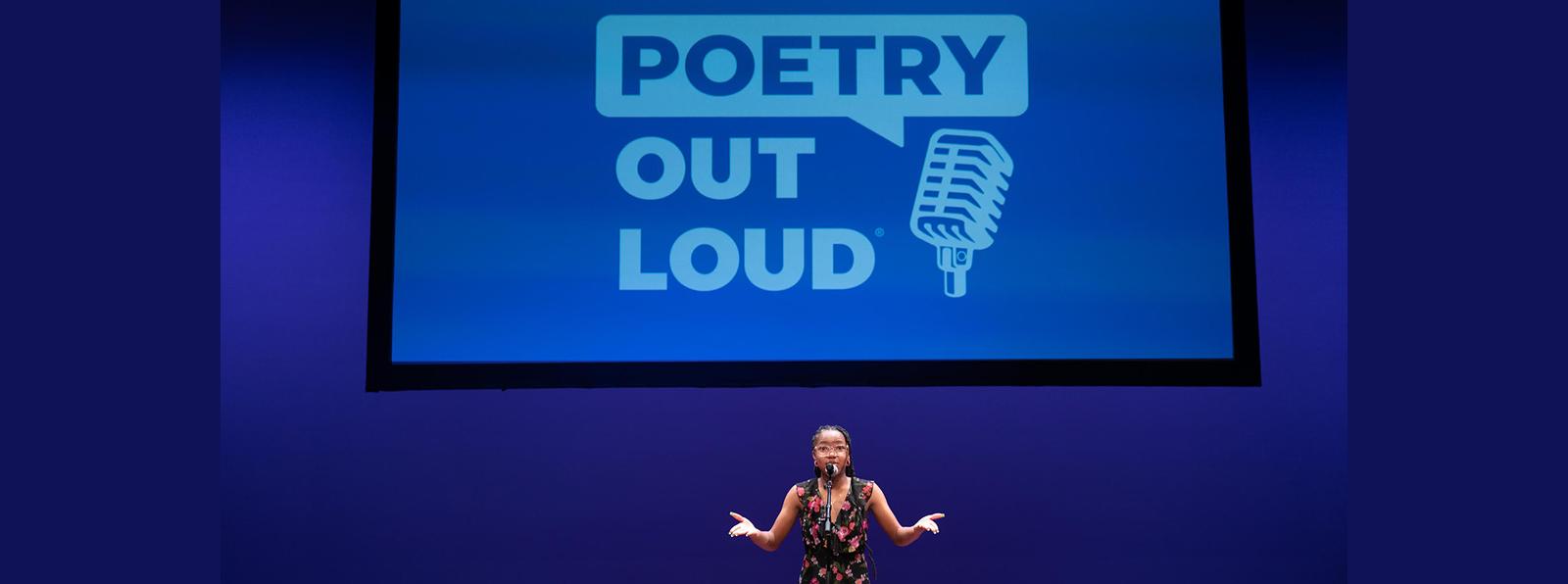 A young woman expressively performing onstage beneath a large, projected image of the Poetry Out Loud logo.