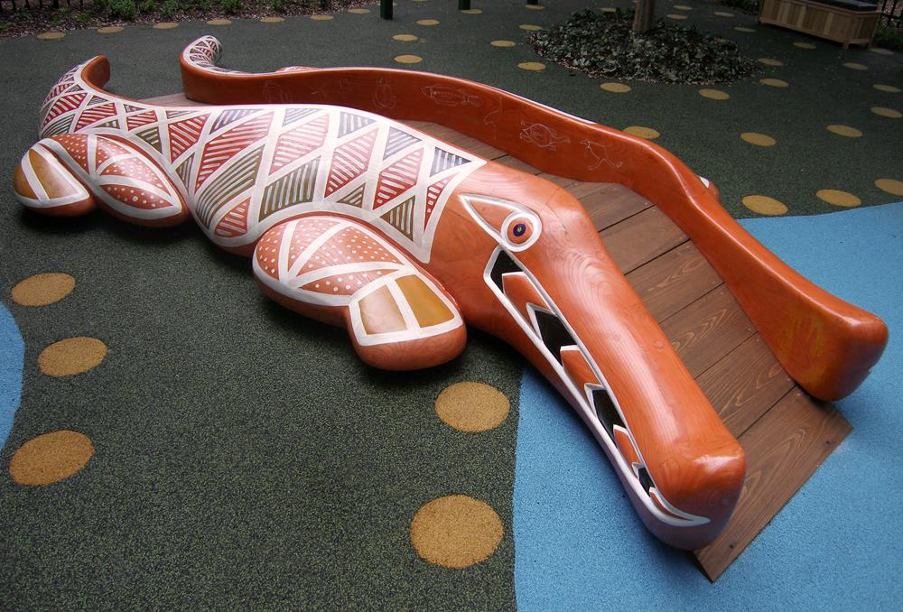 18' long wooden aboriginal-themed crocodile-climber for Discovery Communications Steve Irwin Memorial Playground infant area.