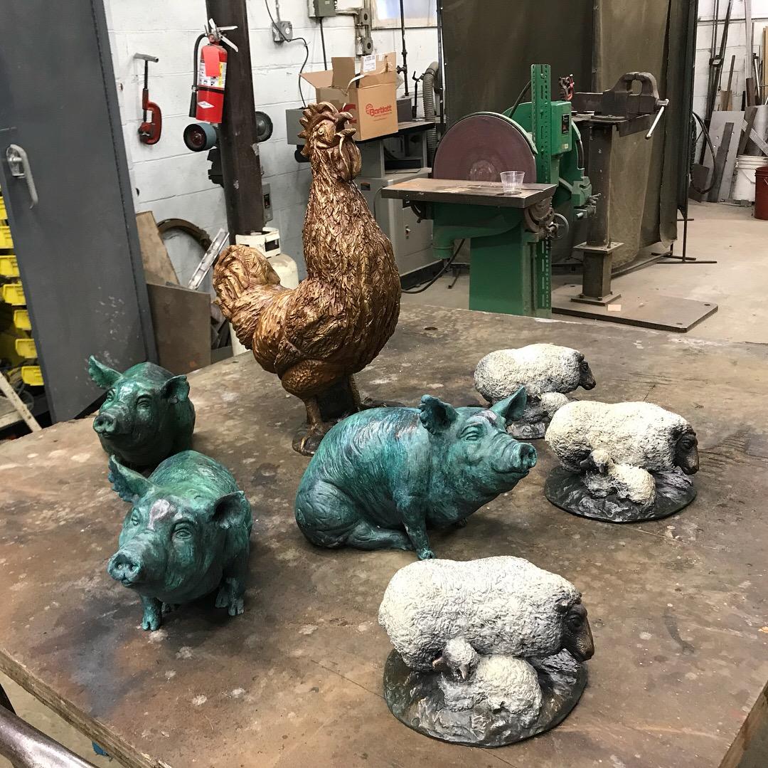 Each piece was sculpted in clay. A mold was made for each piece. My pieces were cast in hydrocal and also cast in bronze.