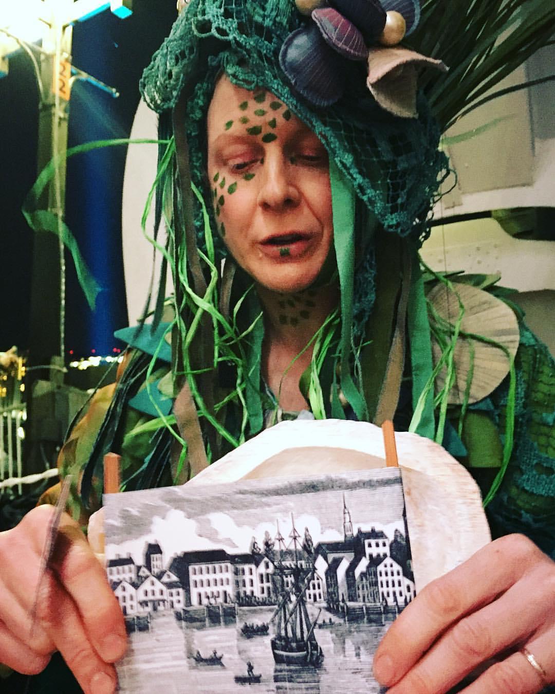 Riparia is an ongoing performance project motivated by my interest in storytelling as a potent and ancient form of popular edutainment. Specifically, I am interested in how storytelling and interactive performance generate curiosity and exchange between performer and audience, and allow participants to learn more about the place they inhabit.
Riparia conducts ‘Web of Life Card Readings’ using a (still-evolving) deck of cards, emblazoned with images representing ecological and political themes. Tapping into popular interest in ‘fortune-telling’, Riparia does not claim to augur the future. Rather, the act of pulling cards effects a temporary, introspective space in which people are guided in responding to the images, reflecting on their relationship to the land, to their communities and to the forces of destruction and restoration. Riparia also utilizes a hand-sewn map of the Chesapeake Watershed and a small theater set inside an oyster shell (‘The Pearl’) to share stories about the history and ecology of this bioregion and explore people’s relationships to the Chesapeake and the bodies of water near their place of birth.
The performances are intimate events for one or two people at a time.