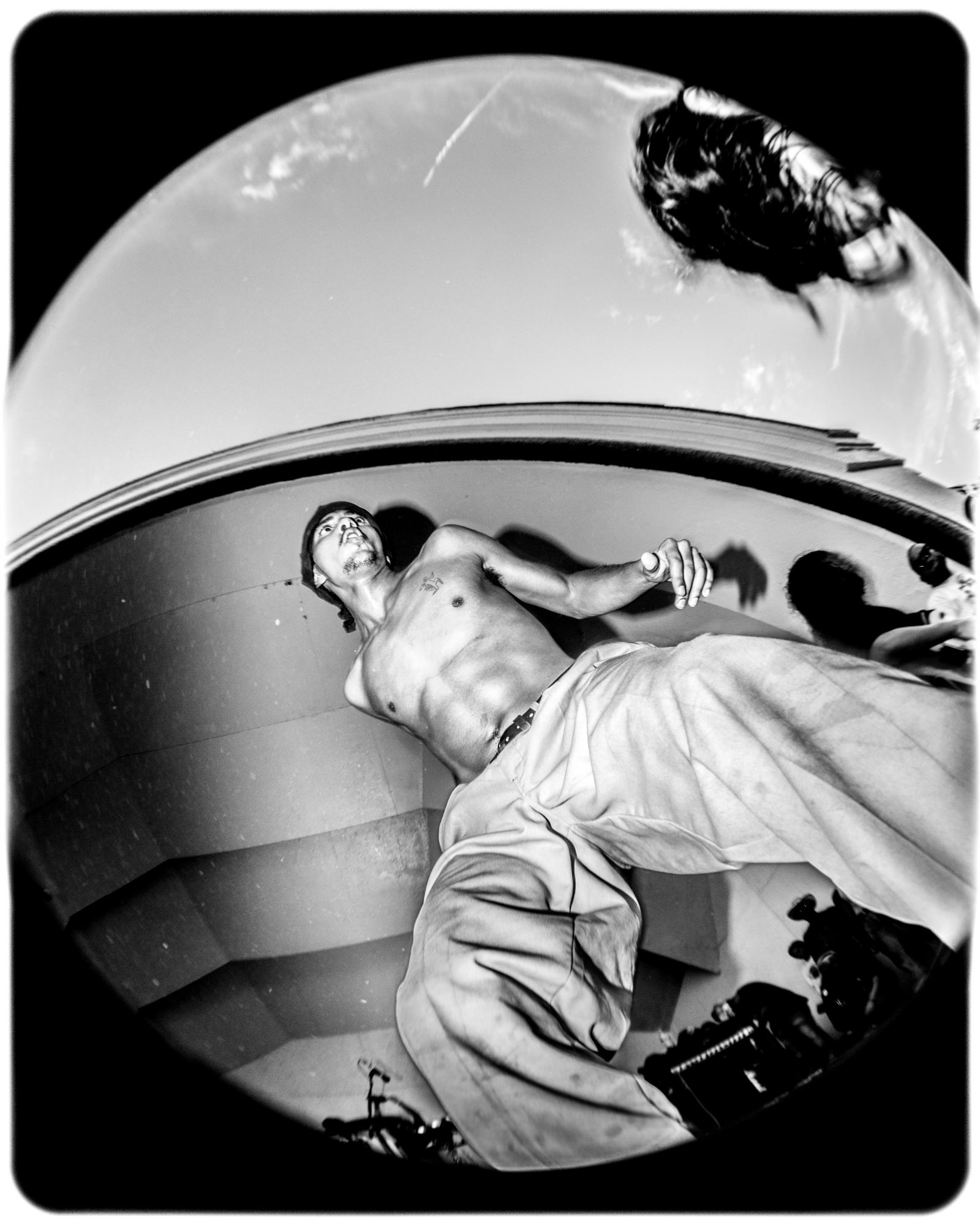 Photograph of a stage diver during Turnstile's set at the Clifton Park Bandshell in Baltimore, MD on 8/21/2021.