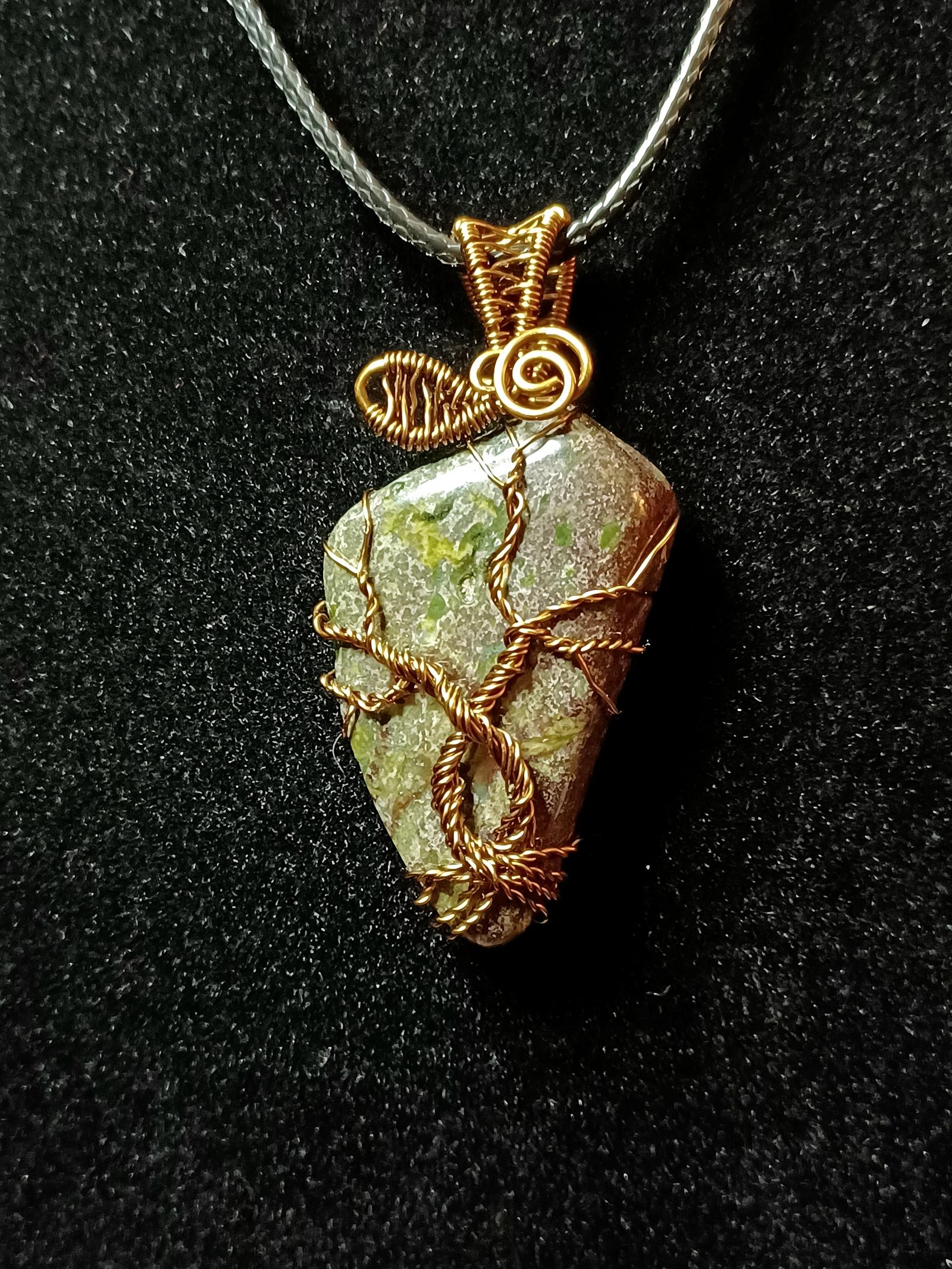 Bloodstone wrapped in copper wire 