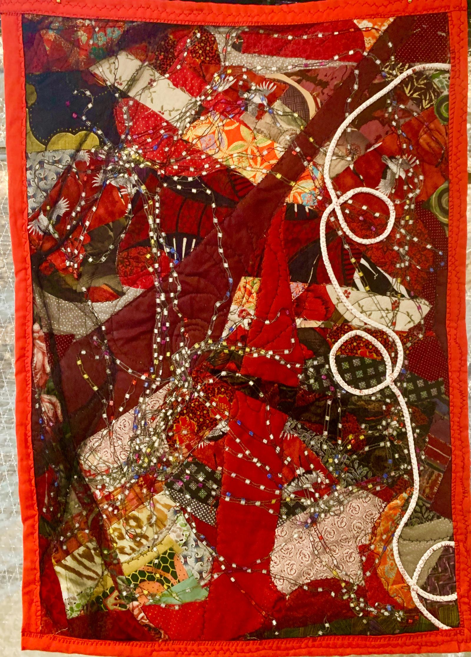 Abstract - Fabric collage- Ethnic and western fabrics, recycled materials, with ribbon, rope, and tulle. free motion quilting
Image represents those whose hearts are so shattered that only the scars hold them together, and how we try to hide that hurt.