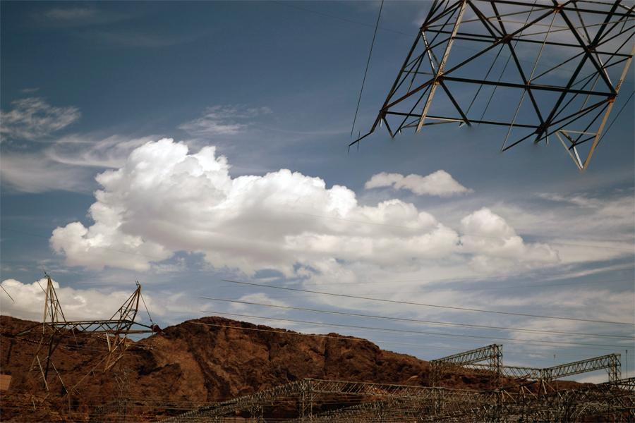 These images are the result of using photo software to auto-stitch images taken from a car window, creating manufactured landscapes from images that were largely unplanned and spontaneous.
