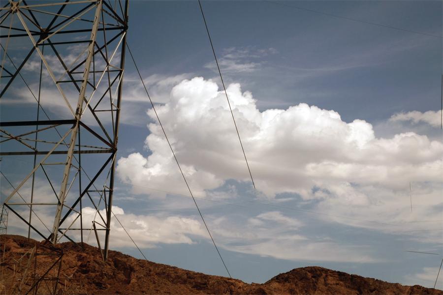 These images are the result of using photo software to auto-stitch images taken from a car window, creating manufactured landscapes from images that were largely unplanned and spontaneous.