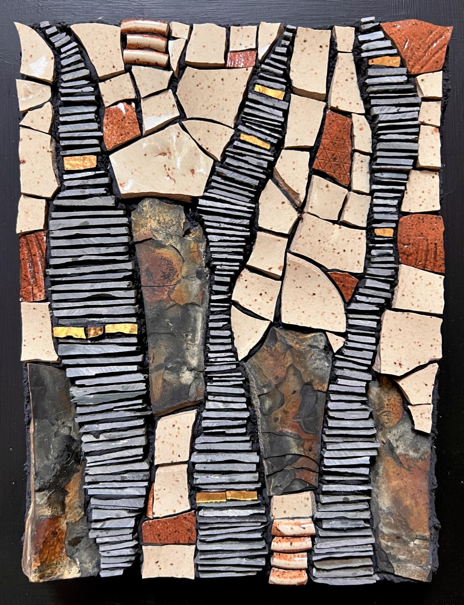 This mosaic, made of slate, shale, and ceramic, is about unearthing authenticity.