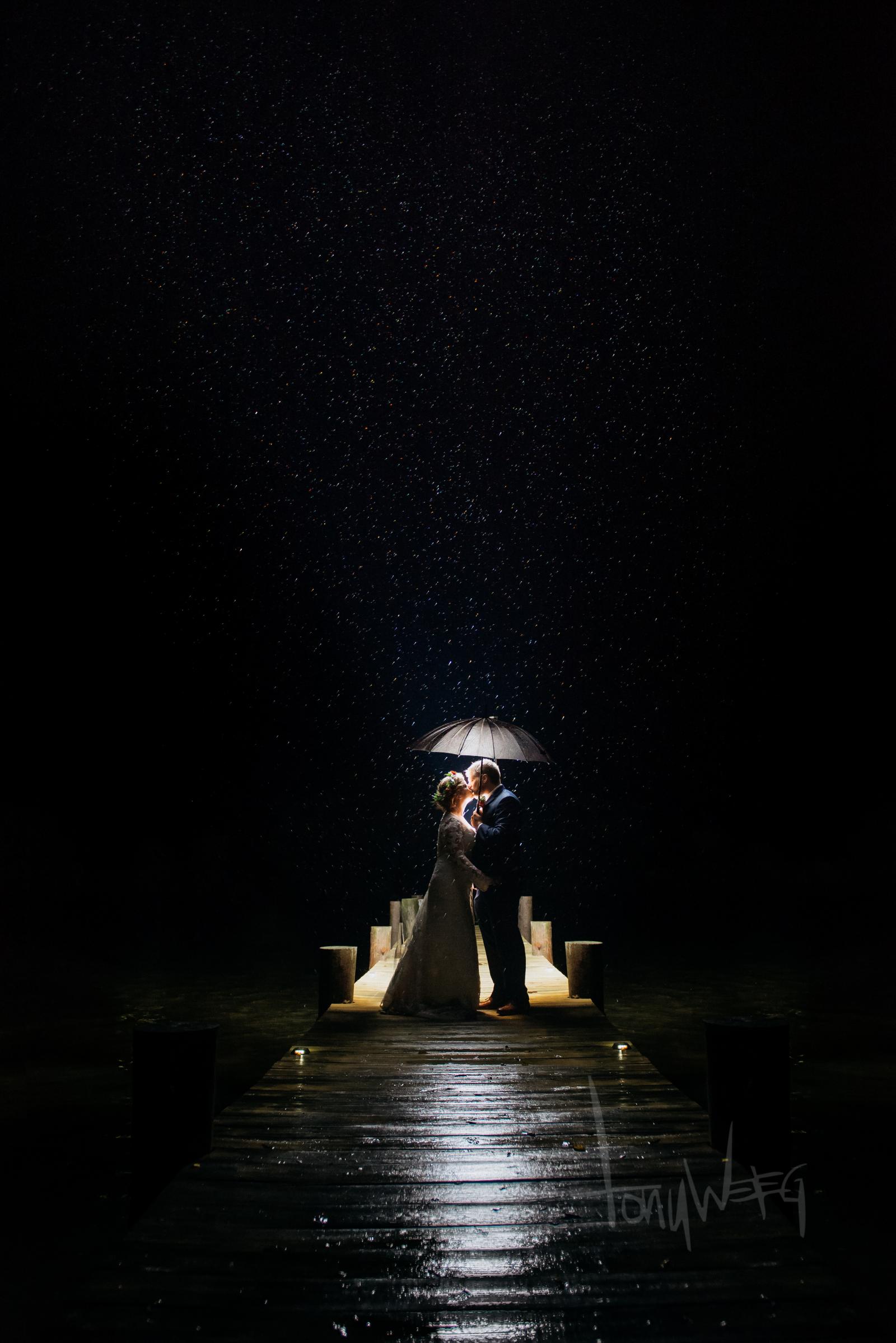 A wedding year set amongst hurricanes did not let this couple get by unscathed. Or me. Late one early October night we had time for one more shot, and Hurricane Matthew made for an amazing backdrop!