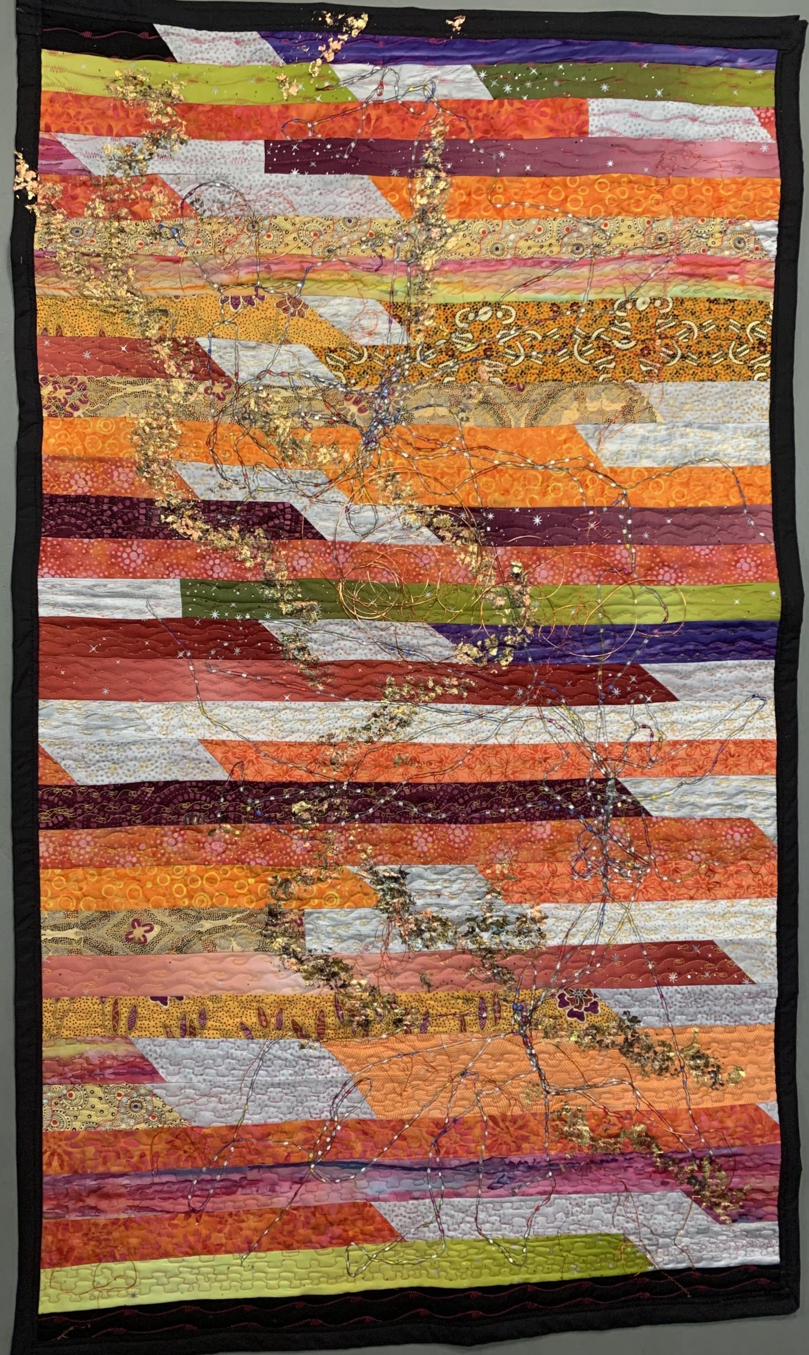 This piece uses primarily Austrailian Aboriginal prints mixed with African and western prints. It honors the Aboriginal coming of age journey called the Walkabout, where young men wander alone in the wilderness. At the same time, it also signifies the individual life journeys we all take. There are many paths. This piece uses gold leaf, ribbon and copper wire to represent various life paths. Some wires are left free in sections to show our ability to alter our paths - but only to a degree.