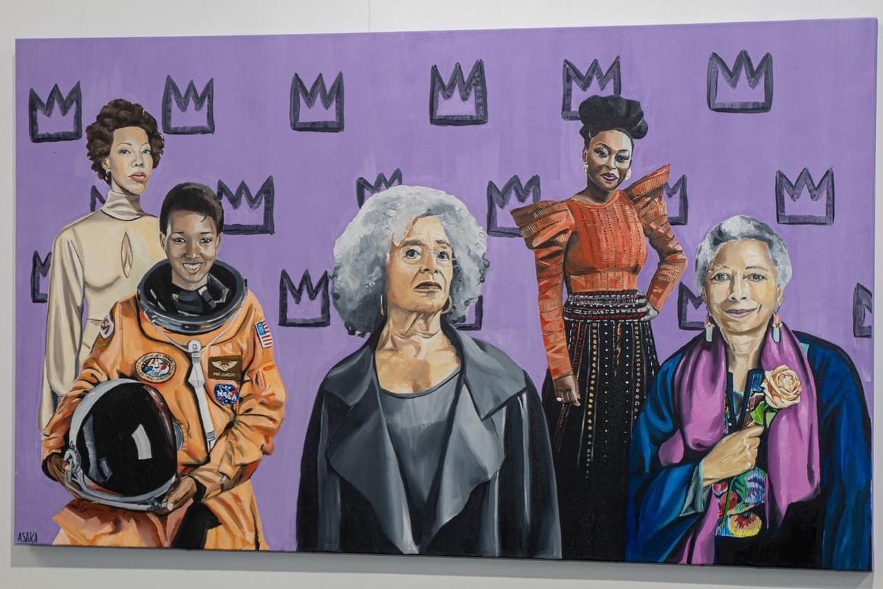 This is a painting of artist Amy Sherald, astronaut Mae C. Jemison, activist/scholar Angela Davis, Chimamanda Ngozi Adichie, and Alice Walker