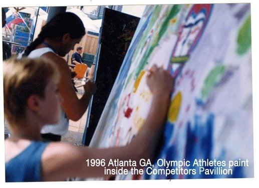 Athletes from around the world painted upon large embossed maps of the world,
I built 6 maps measuring 7 ft by 15 ft, in the 3 week period the athletes filled in the continents and oceans with images of their discipline and flags form home, as well as random artistic expressions.