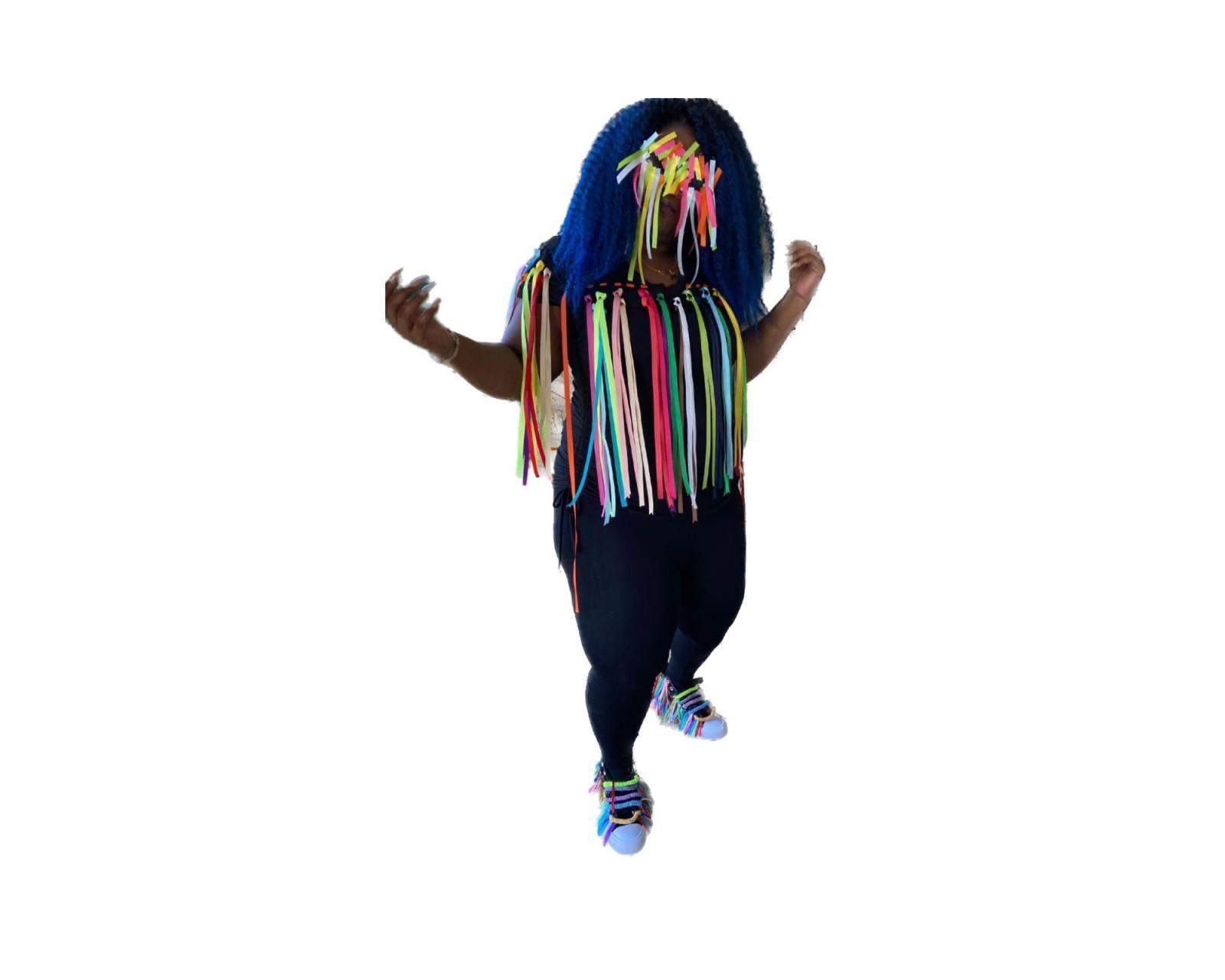 Carnival attire is inspired by the beats in the Spanish Reggeaton music that I grew up hearing in Panama.
In the Universal Carnival Art and Dance workshops, we travel through music and nostalgia, creating colorful costumes and props to dance comparsa style.