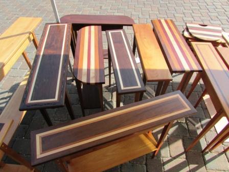 Examples of my tables and cutting boards handmade from natural hardwoods in a variety of colors, shapes and sizes. Go to etsy.com and search for my shop, Adiante Franszoon view and purchase specific items. Items can also be custom ordered. Please contact me at 410-598-2849 or adiantefr@yahoo.com 