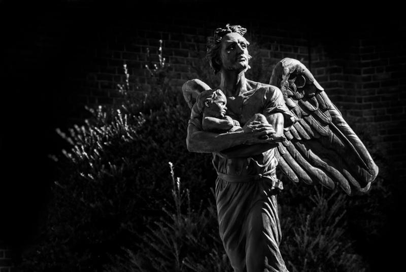 Angel Statue located in memorial garden of Christ Church, Kensington MD