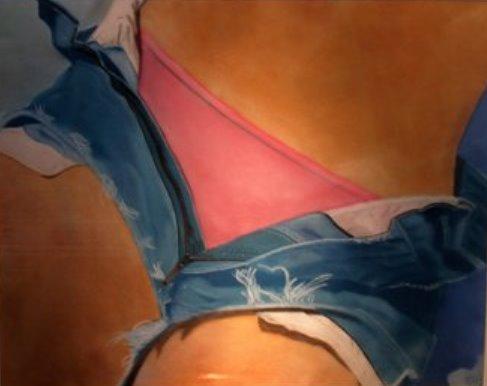 This is a picture of a girl chilling on the beach with her Dazy Dukes on.