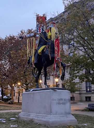 Indigenize colonial spaces to remind viewers of the Aboriginal Indigenous Americans wining the Buffalo Soldier Wars. Inspired by 103 Amazing Facts about the Black Indian collaged all over the kimono piece emphasizing the indigenous erasure that colonization been intentionally made to hide the truth of The  Black American People as the Indians of The Americas. 