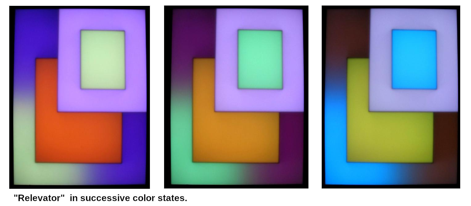 "Relevator" is a light-painting made with RGB LED strips behind a diffusing screen.
The image shows three color-states as the colors slowly change.  Due to the large number of possibilities, color combinations are unlikely to repeat.