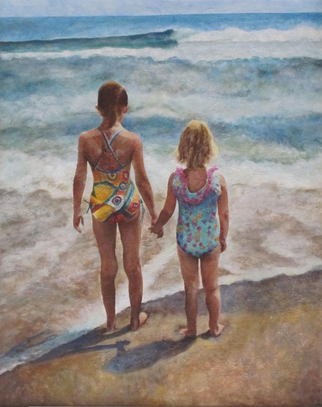 Our daughters were captured by water's edge at the Outer Banks of North Carolina on a beautiful summer day. 