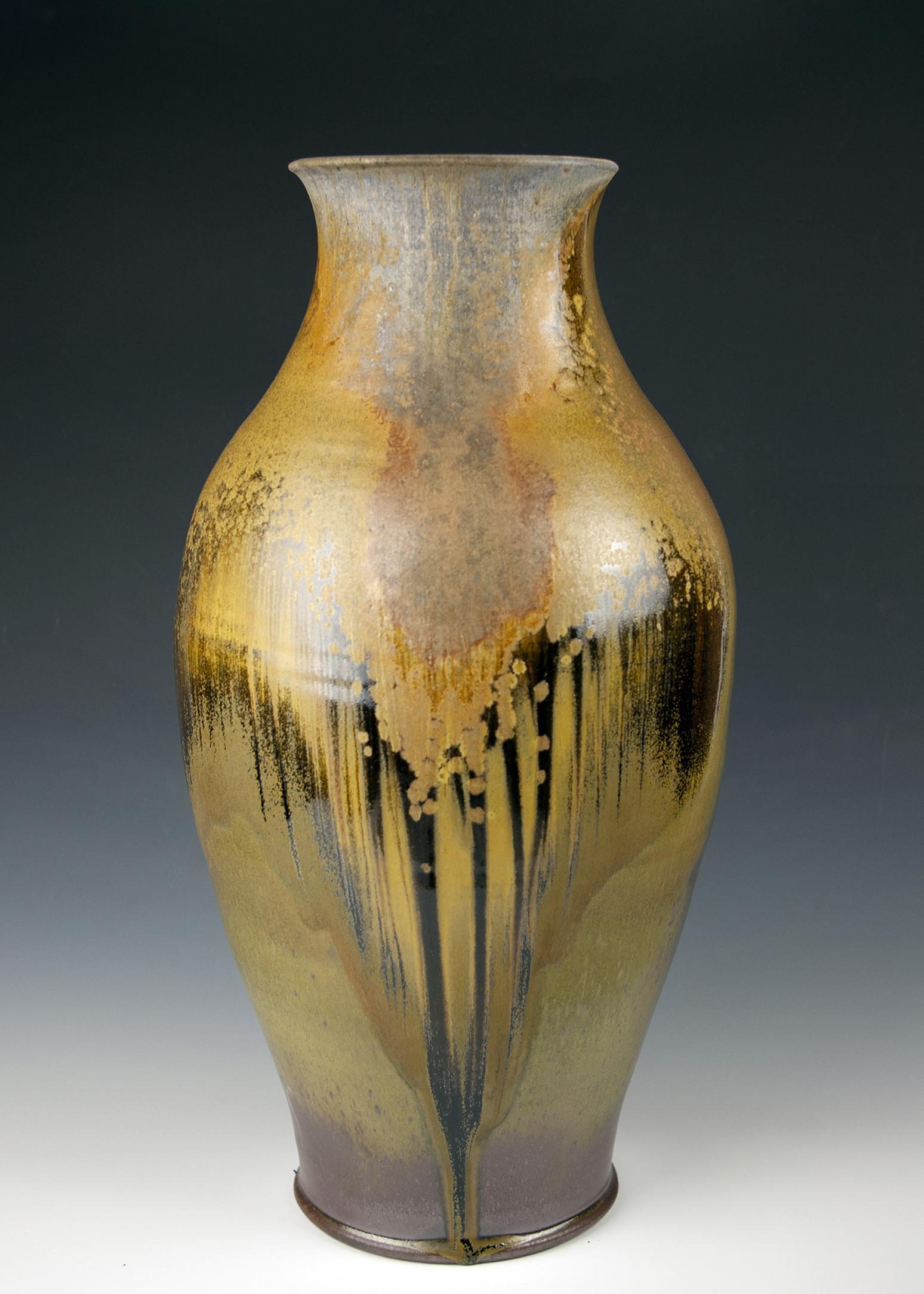 Tenmoku and SCM glazed wood and soda fired large jar fired to cone 13 in an anagama kiln. Pick up only.
