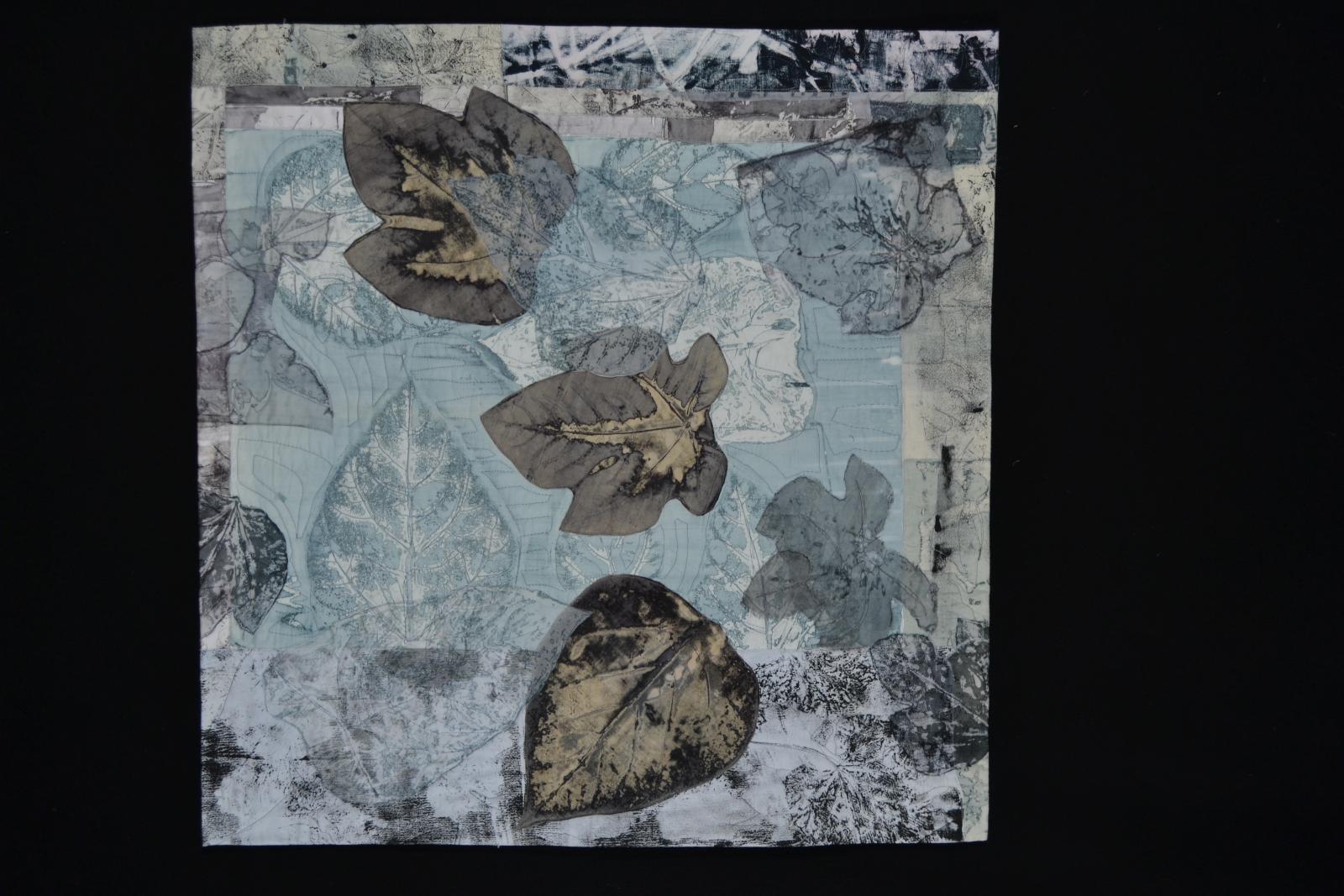 deconstructed screen print of leaves,blue and gray