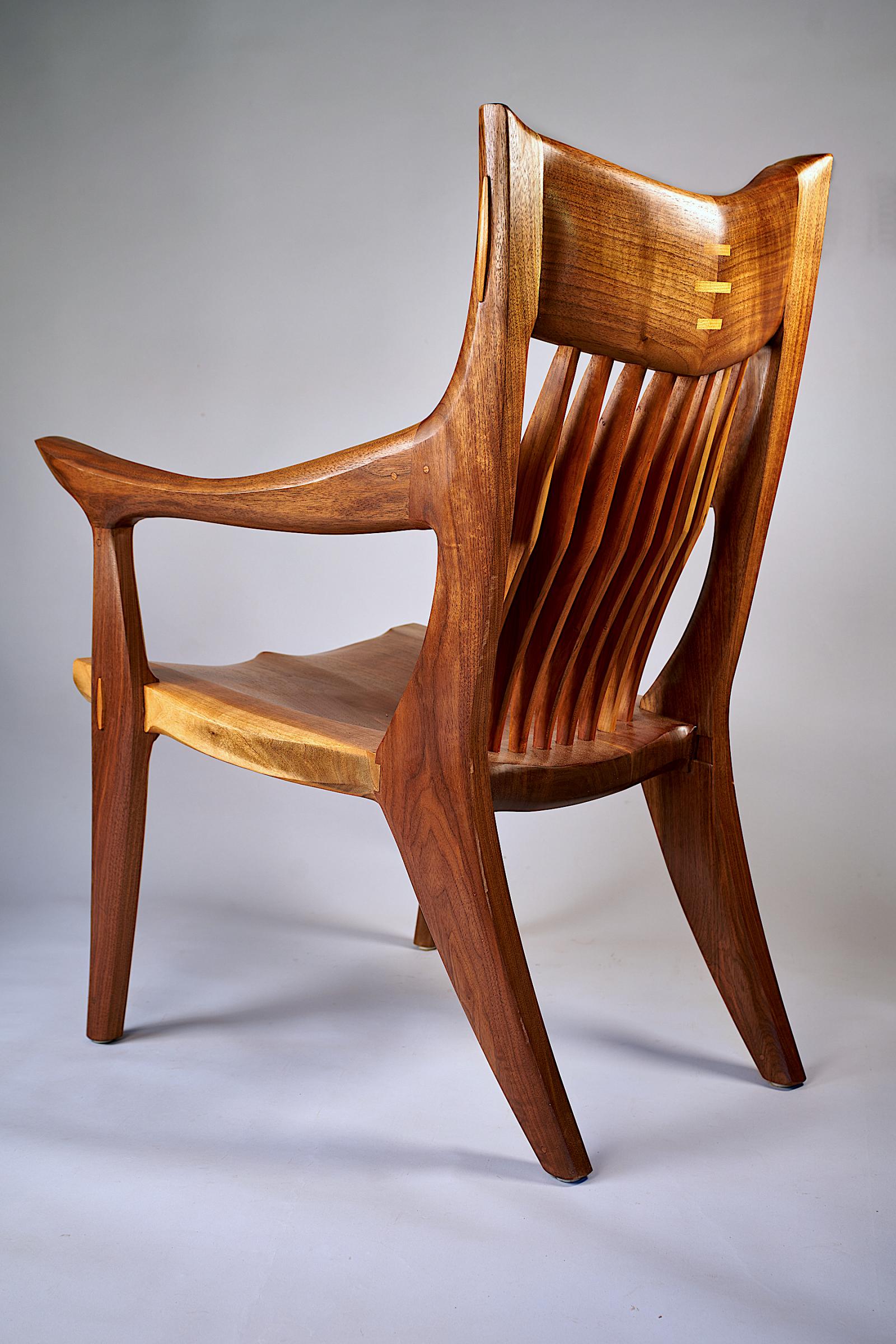I listen to music while I work, often vintage rock, and this chair started with an old Beatles tune. Got me thinking about birds, with their curved and tilted wings.  The resulting Blackbird Chair recalls a bird, stopping in mid-flight,  startled, about to reverse direction, swooping in to land.