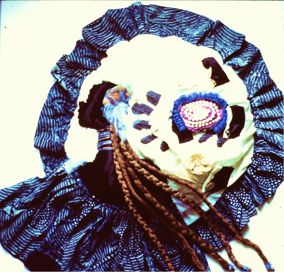 As a Fiber Artist, this painting visualizes a limerick taught to me by my Great Grandmother:
"Courtin is sweet but oh how bitta
To court a girl and then not getta"!
I also learned from her how to make rugs (the plaited hair) from stockings, and from my Grandmother hand-making ruffles and beads. The indigo fabric is from travels to West Africa. This piece was originally exhibited in my one-woman showing in Ohio during my doctoral studies. Since then, it has been shown throughout the U.S. and Canada (see resume).