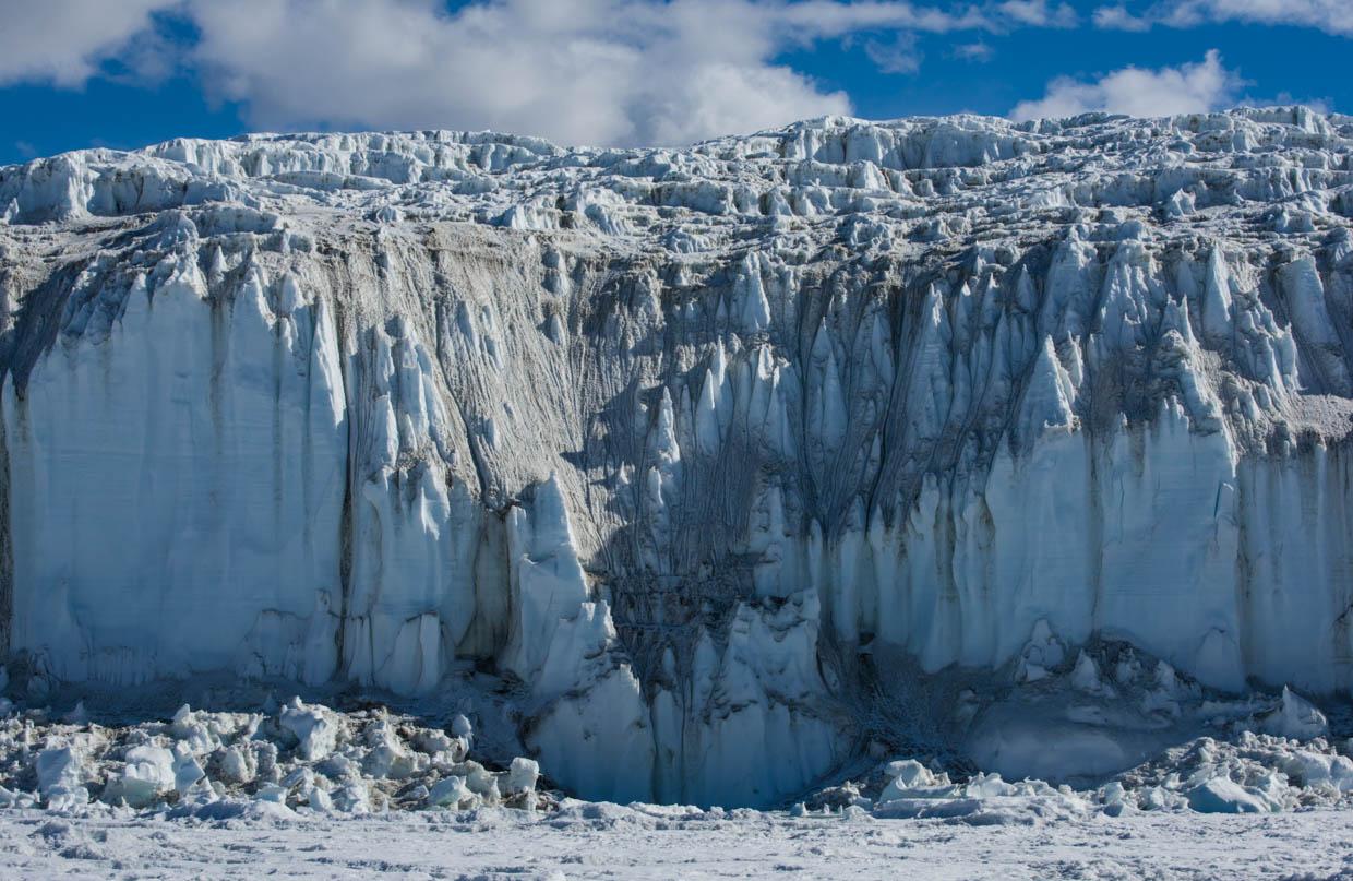 A section of the massive, spired 60-foot-high side of the Canada Glacier photographed from the frozen surface of Lake Fryxell.