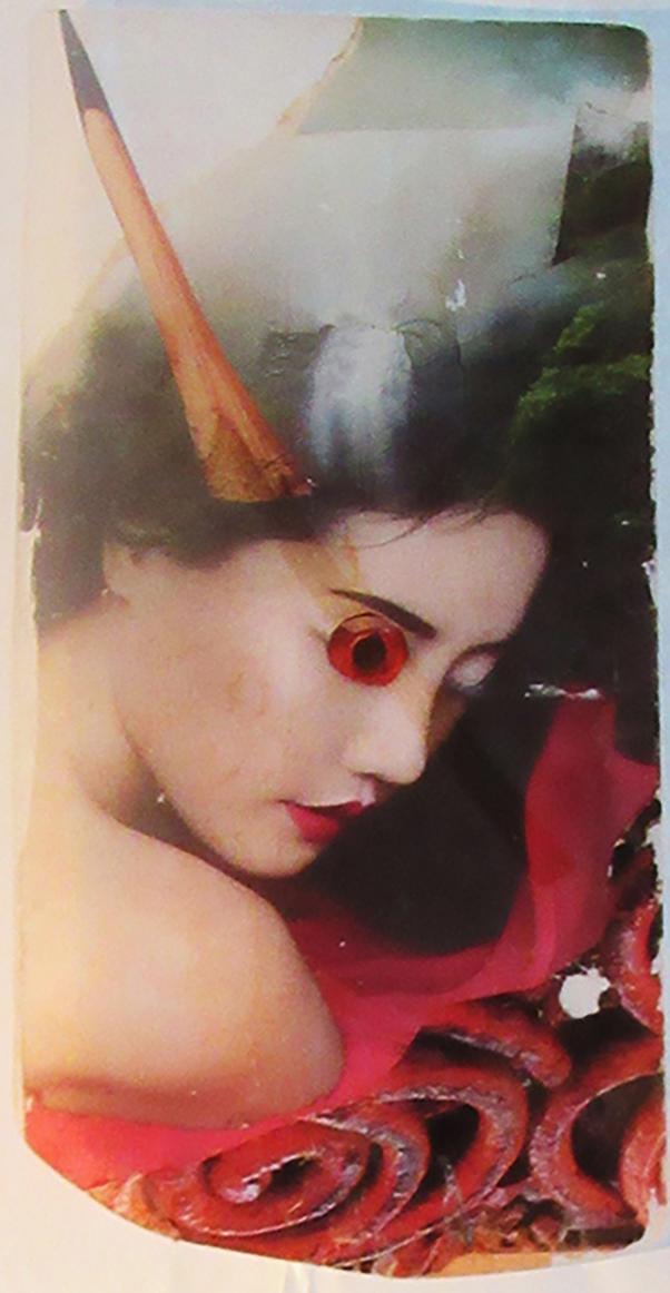 portrait of woman with a horn and a strange eye