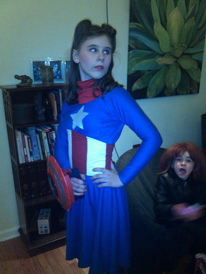 This was a cosplay/costume that I made for my teenage daughter that consisted of a fully boned waist-cincher and long-sleeve, jersey knit dress with machine embroidered 5-point star on the front.
