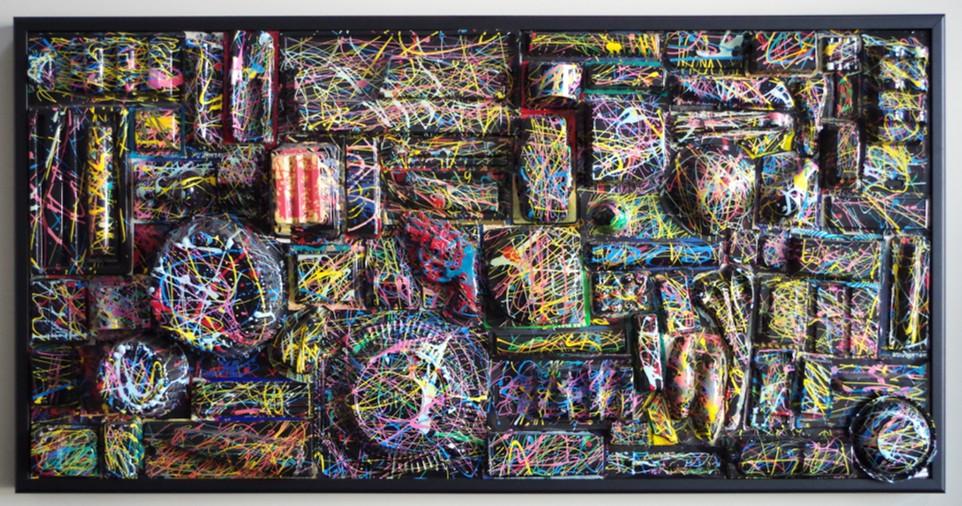 Created for a show titled 'Recycle Millenia', this piece is one of an ongoing series.
The work re-uses 70 pieces of plastic product packaging, painted then collaged into a framed space.
When this piece was displayed in a gallery setting or elsewhere, I've seen how this piece becomes something of a guessing game with people quizzing each other about what had been inside each of these shapes. I also hope it serves as an environmental statement, asking a viewer to reconsider how much packaging waste we encounter on a daily basis.