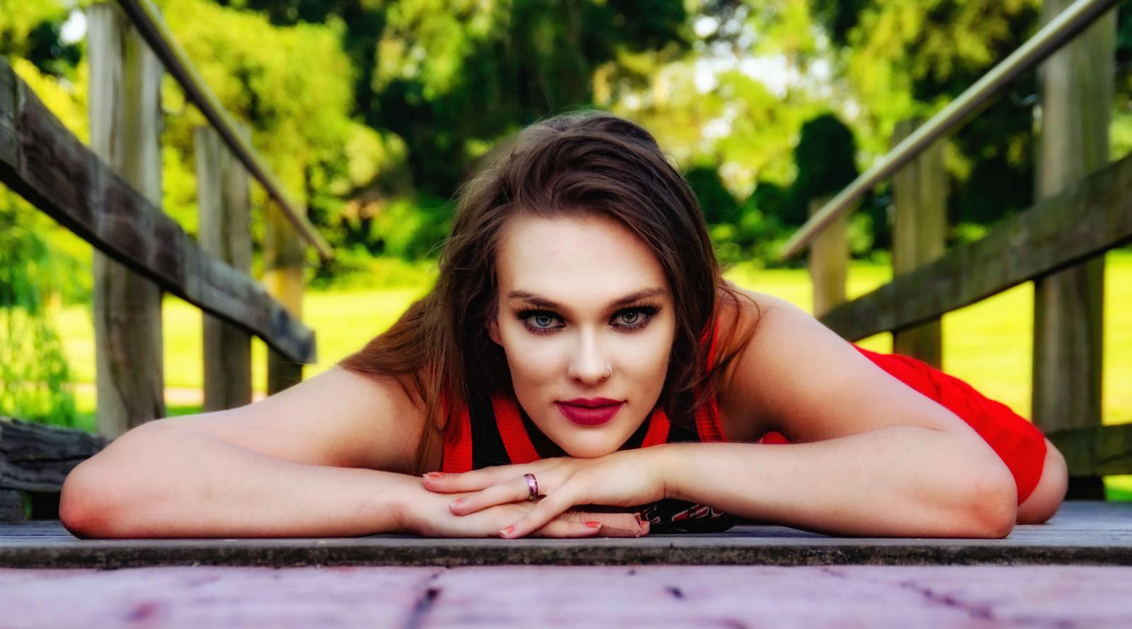 A photo of model Courtney Ruda on a bridge at Swan Harbor Farm.