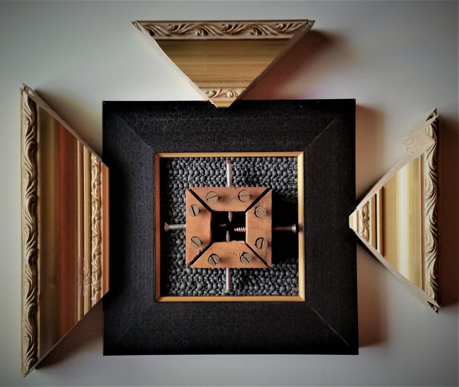 Assemblage made from discarded framing and furniture remnants.