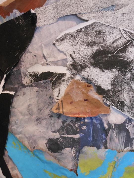 detail shot of collage mask - face composed of torn pints, ink drawings and acrylic paint
