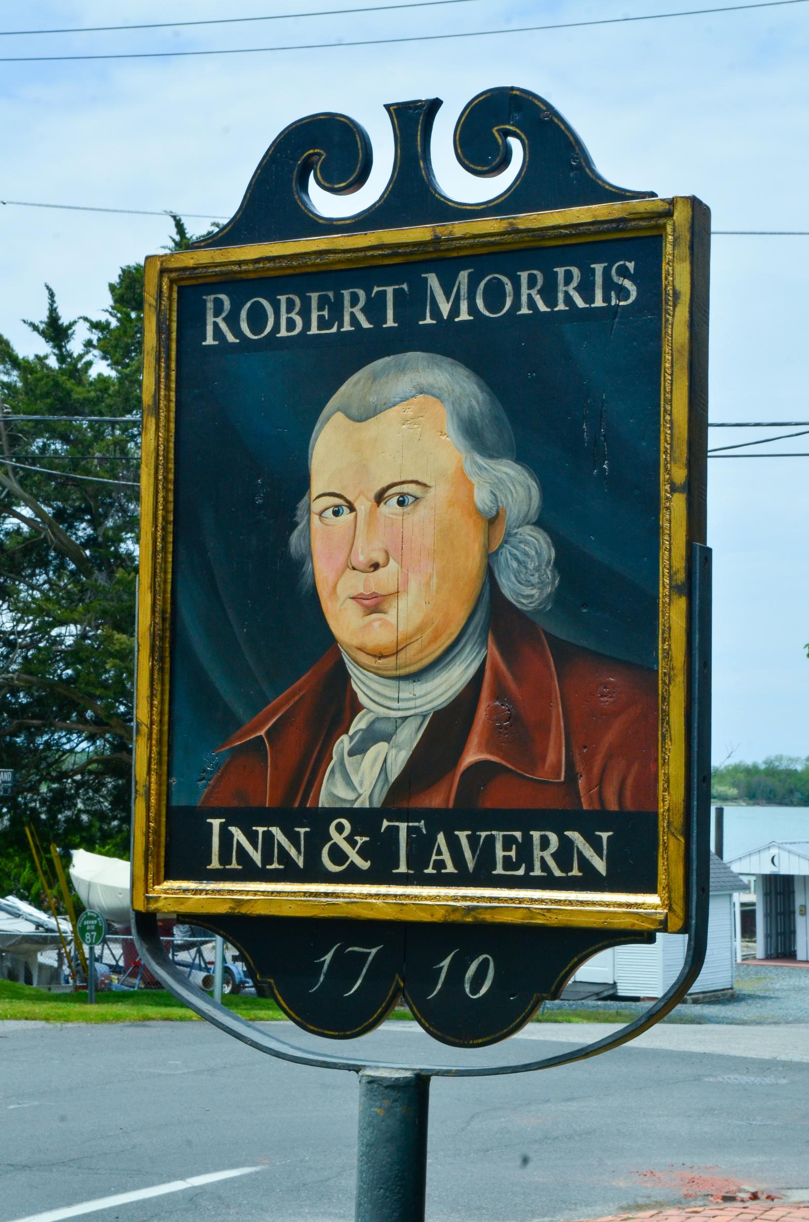 An outdoor sign created for the Robert Morris Inn featuring a portrait of Robert Morris. The Inn is located in Oxford, Maryland.
