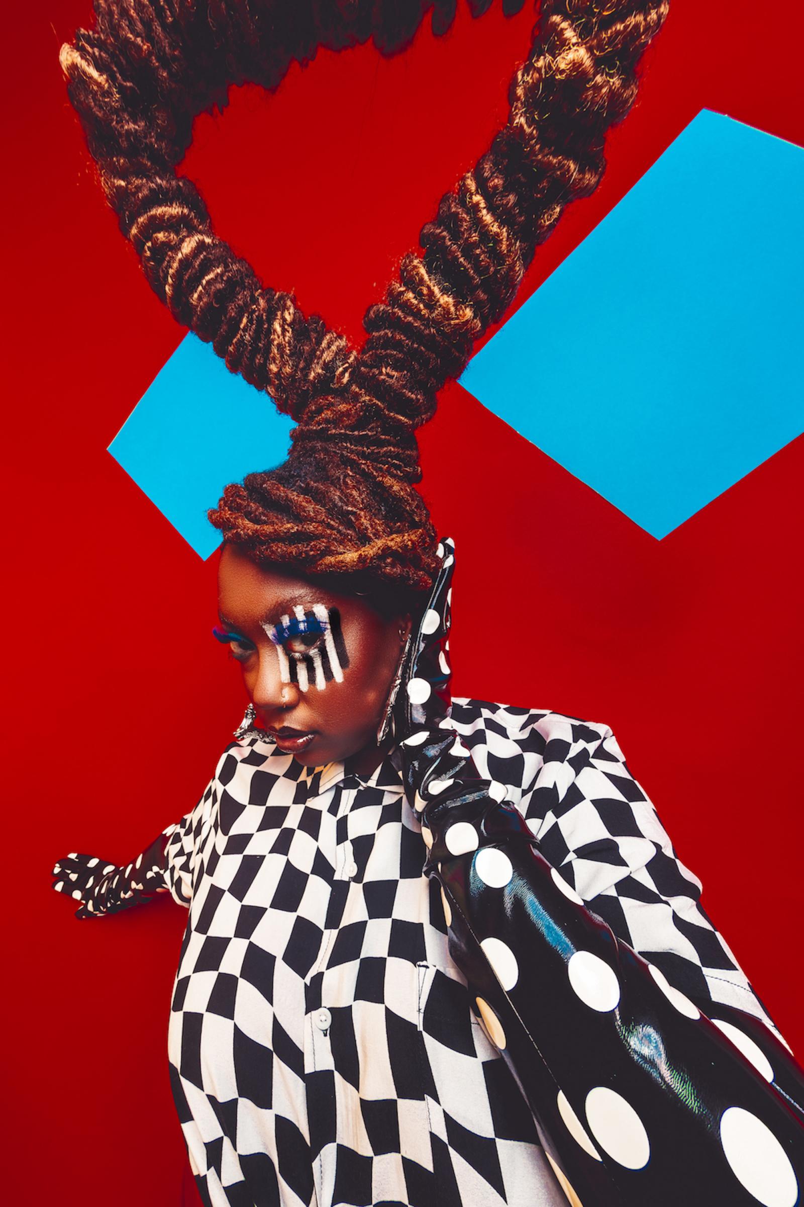 Nia Hill is a creative consultant based in the DMV metropolitan area. This still is from my project DEATH TO ASSIMILATION, which tests the boundaries of assimilation in the workplace.