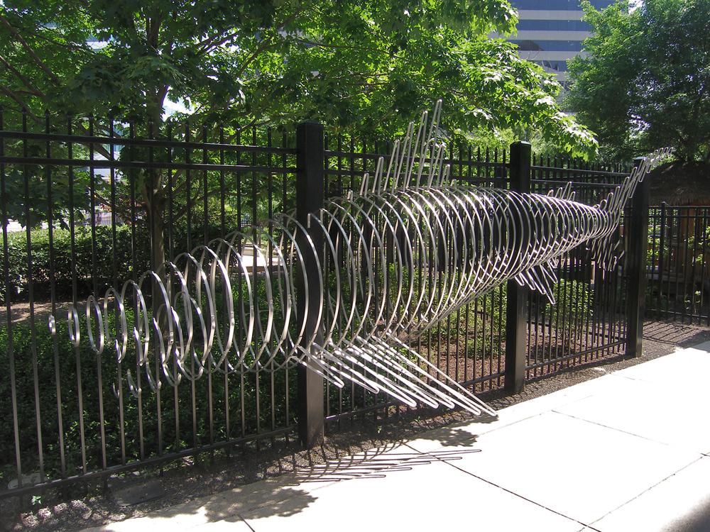 shark, mounted on break-away security rivets, one of three sculptures for Discovery Communications, Silver Spring, MD 