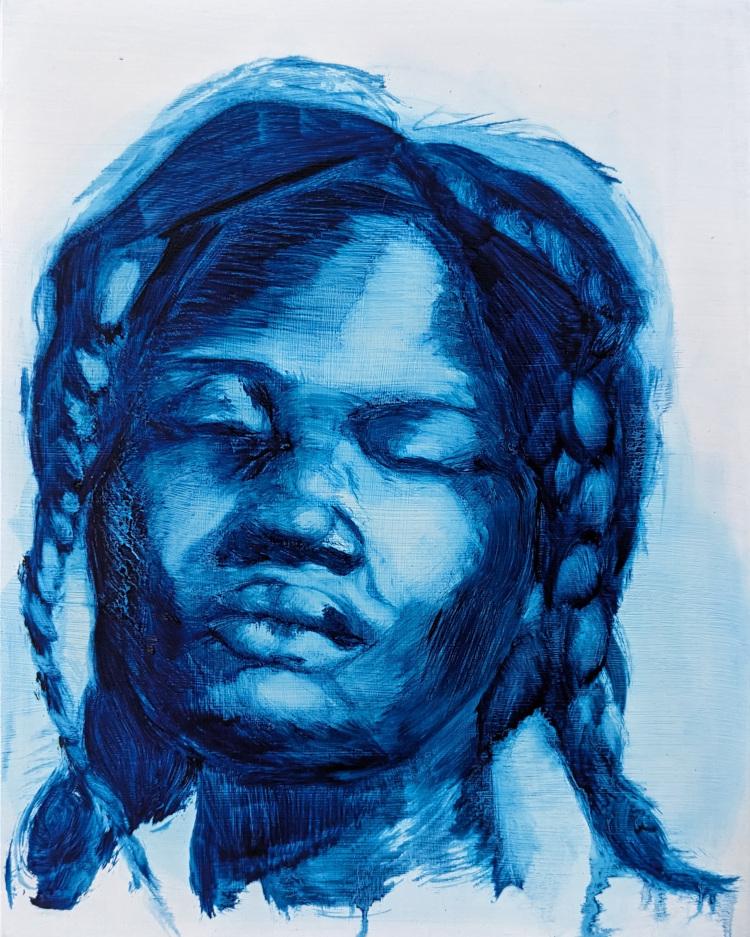 Prussian Blue monochrome portrait of a feminine face.