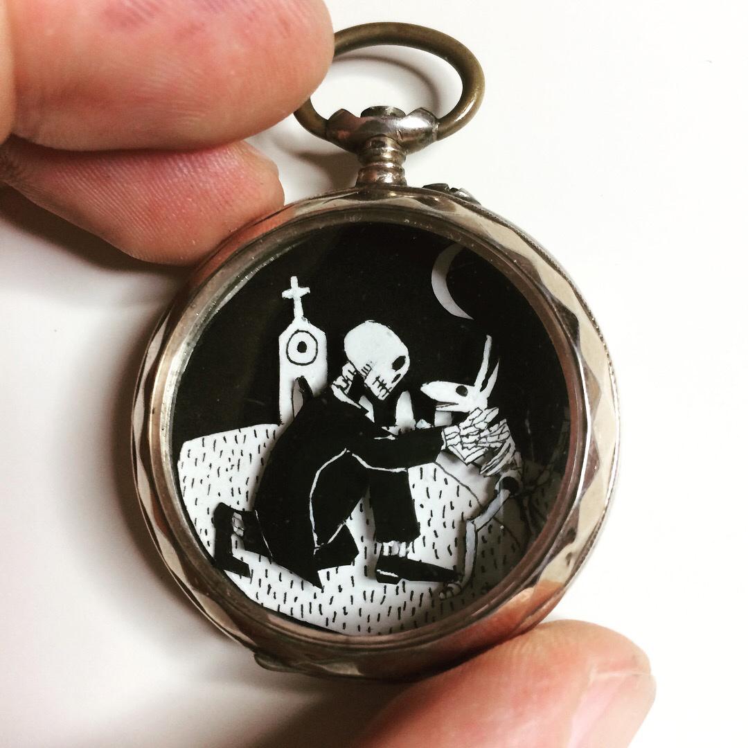 A cut paper diorama in a pocket watch, "A Reunion" was on display at the American Visionary Art Museum for the Great Mystery show during 2017-2018.