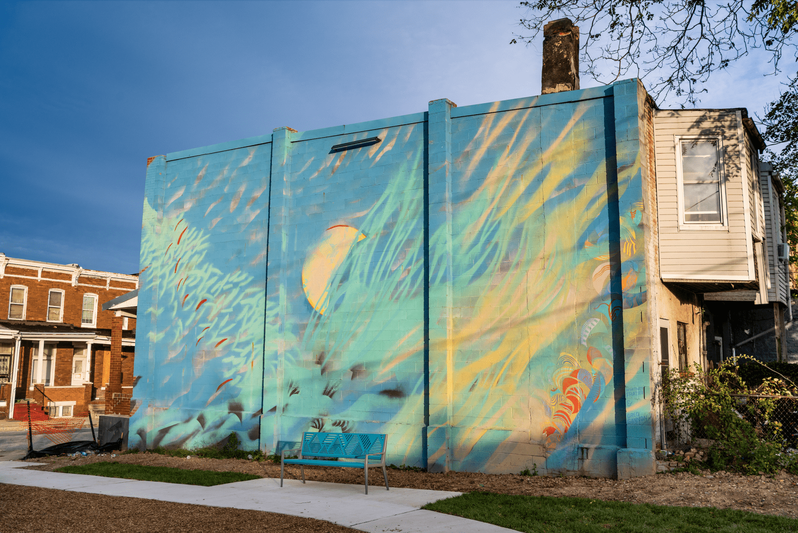 Gateway Park, East Baltimore
Community beautification project for larger redevelopment park. Collaboration with community leaders, M.I.C.A., students and local sign painter Greg Cannon.
Interactive Public Spaces including large scale murals (vertical and horizontal), performance stages, sail cloth flags, play equipment, trees, resurfacing, chess boards, signage.