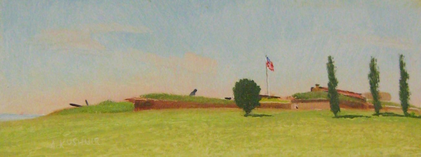 A hillside with Ft. McHenry on top, w flag on flagpole, and blue sky