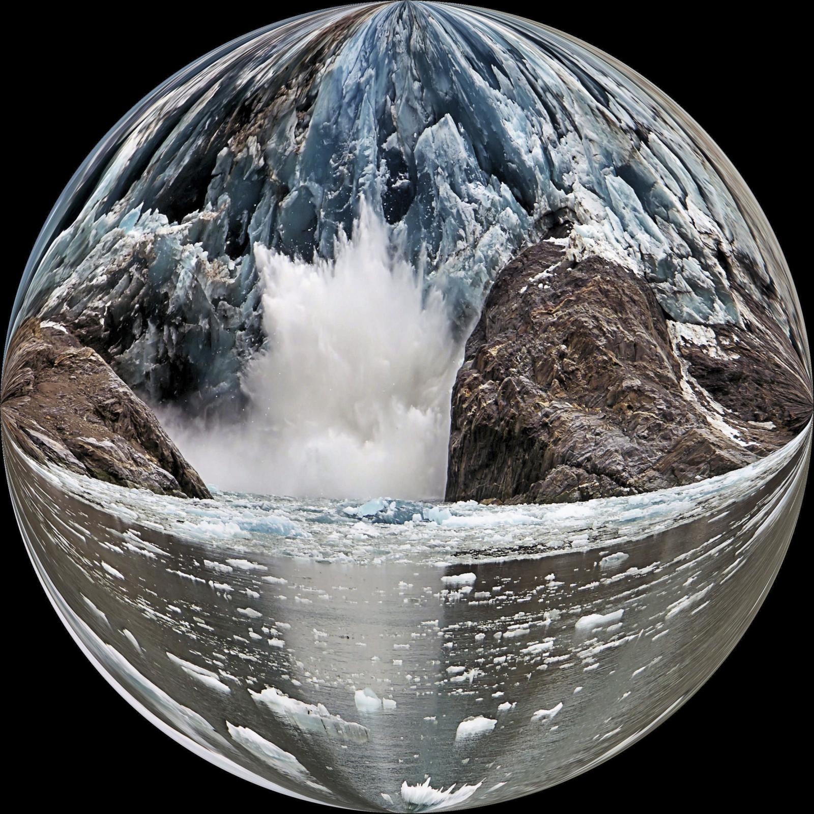 This image depicts the loss of Alaska's glaciers due to global warming. Showing the calving of a glacier in a globe drives home the point that global warming is a worldwide issue.