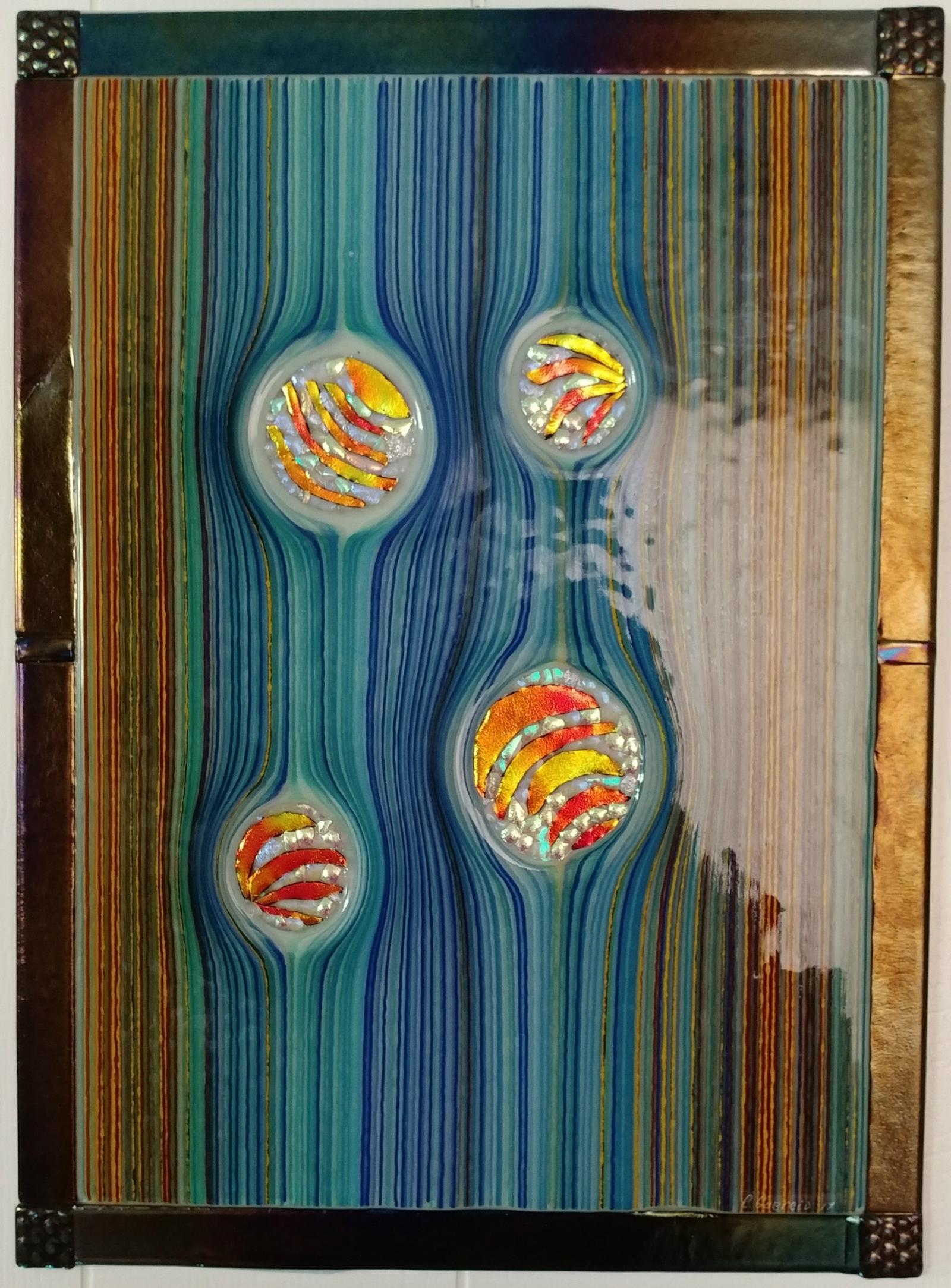 fused glass wall hanging depicting gravity waves