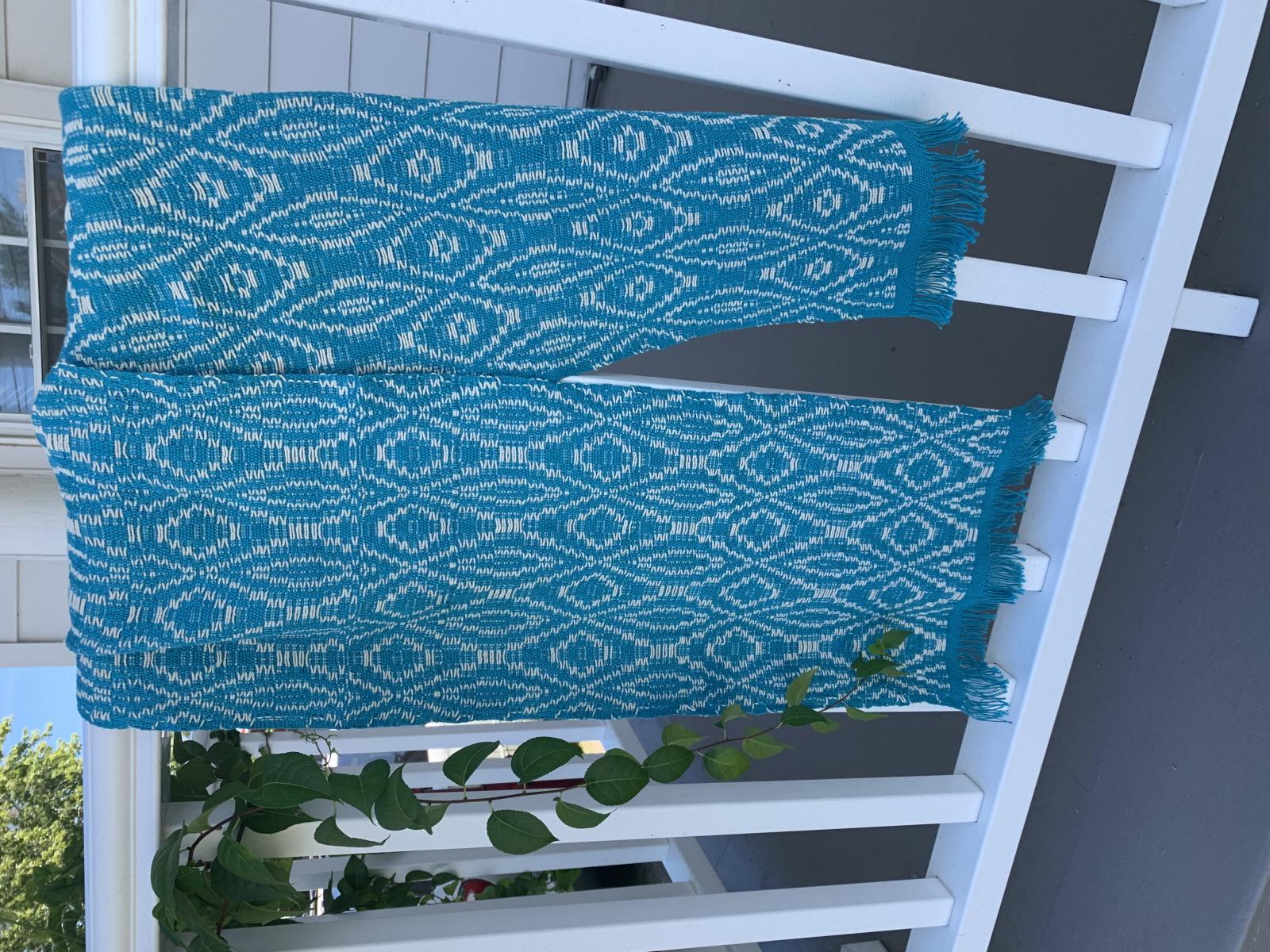 Woven using a cotton warp and weft this scarf follows the traditional overshot pattern found in Deborah Chandler's "Learning to Weave"